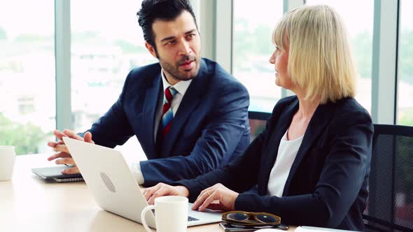 Two Happy Business People Celebrate at Office alt
