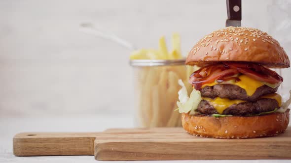 Fresh Tasty Burger Served with Soda and French Fries on White Table alt