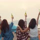 Group of Asia best friends teenagers salute and cheers toast of bottle  beer enjoy party with happy. - VideoHive Item for Sale