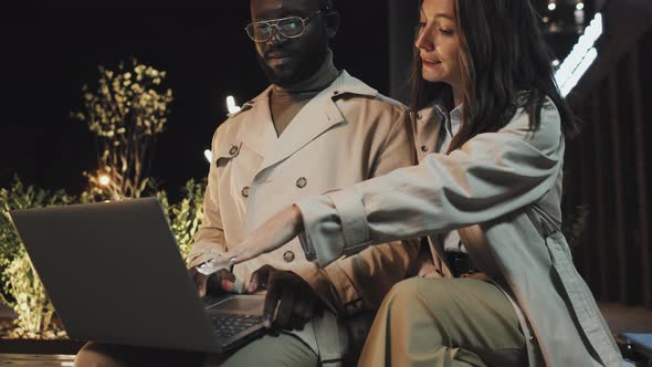 Two Managers Working At Night alt