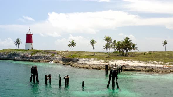 British Stone Tower Of Hole In The Wall Lighthouse In Abaco National Park In Abaco Island, Bahamas. alt