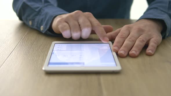 Man using a digital tablet