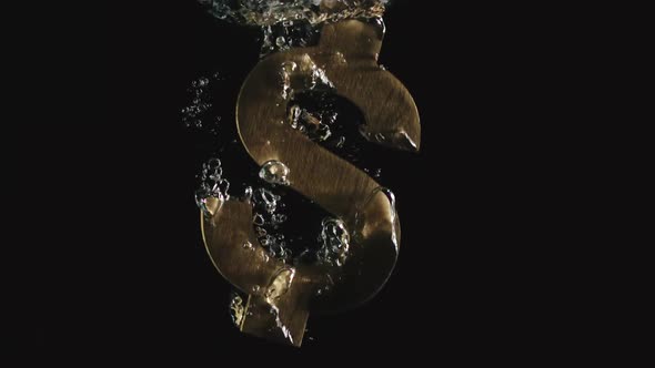 Golden Us Dollar Symbol Falls In Water