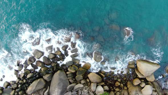 Aerial view Wave sea eater breaking stones coastline .