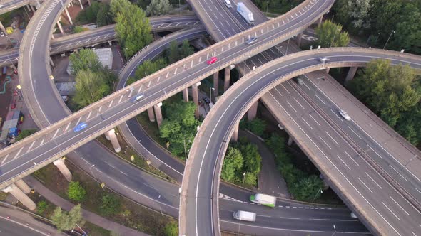 Time Lapse of Vehicles Driving on a Spaghetti Interchange Aerial View alt