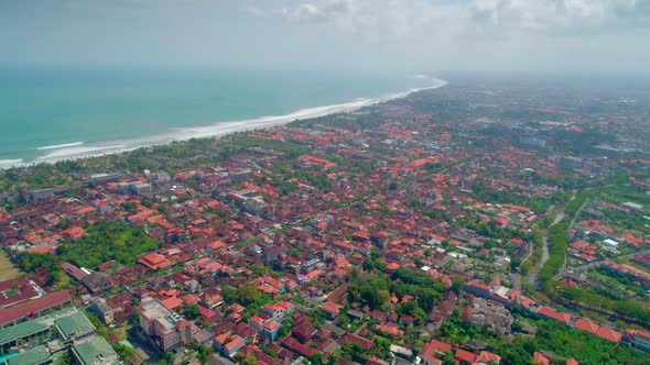 Aerial View The City On The Shore Of The Indian Ocean. The Island Of Bali. alt