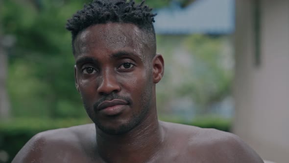 Portrait of Athletic Perspiring Guy Resting After Powerful Workout Training alt