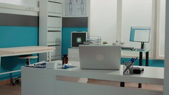 Empty Cabinet Decorated with Stethoscope and Instruments alt