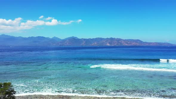 Aerial above sky of beautiful coastline beach lifestyle by blue ocean and white sand background of a alt