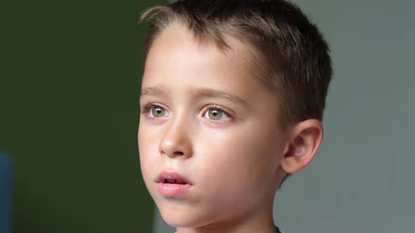 Portrait of a Child Enthusiastically Looking Into the Distance alt