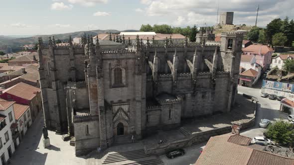 Exterior facade of portuguese cathedral in Guarda Portugal touristic place drone scene