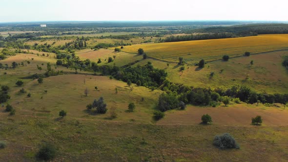 Aerial View of Green Fields and Hills on the Countryside, Green Valley, Village Skyline alt