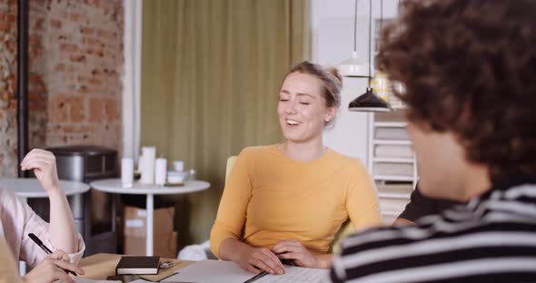 Slow motion shot of students during meeting alt