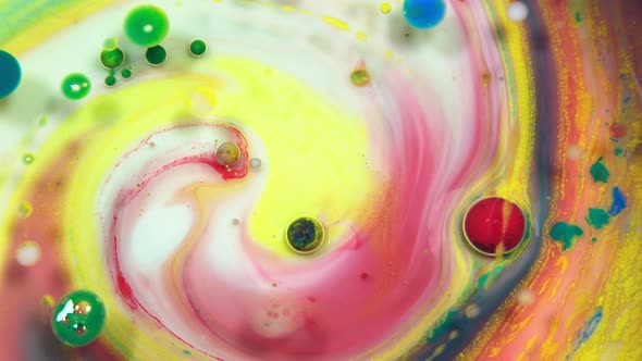 Colorful abstract bubbles and drops on the yellow pink and white water surface