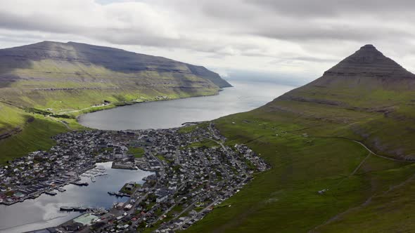 Drone From Klakkur To Klaksvik Town Below alt