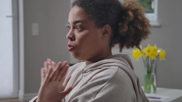 Side View of Shocked African American Woman Gesturing No Crossing Hands alt