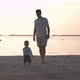 Toddler Boy Walking Near His Father on Tropical Island Beach - VideoHive Item for Sale