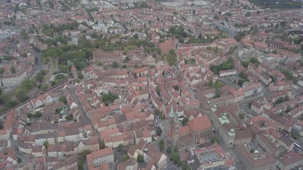 Aerial view of Nuremberg old city on Pegnitz river Half-timbered buildings Church Sankt Sebald roof 