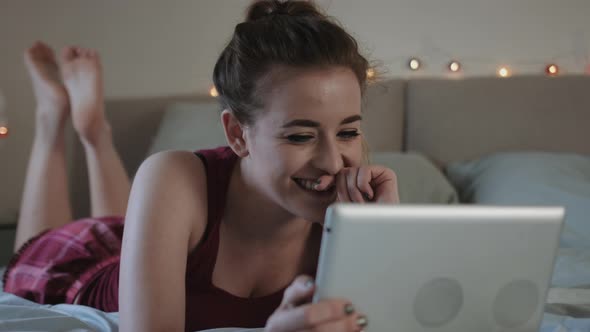 Young female video call on digital tablet