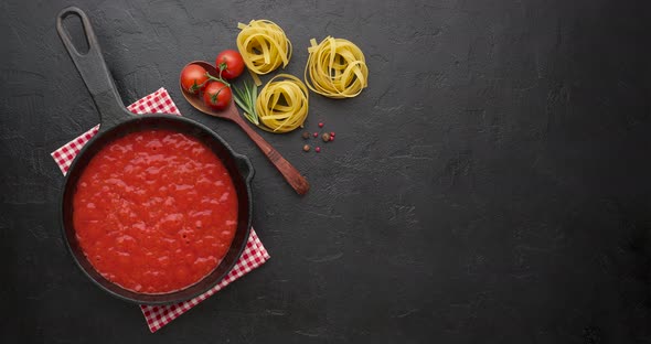 Bubbling hot tomato sauce for pasta, cooking in pan