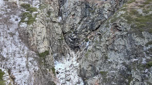 Waterfall Surrounded By Rocks