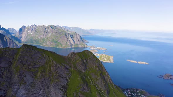 Flying Above Mount Reinebringen Towards Reine Village on Lofoten Islands alt