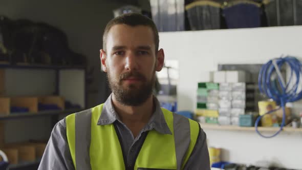 Worker looking at the camera alt