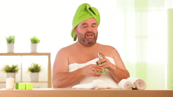 Overweight Man Drinks Beauty Cream at Health Spa
