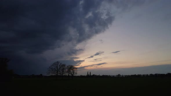 Aerial Video Taken with a Drone of a Dark Ominous Grey Storm Clouds alt