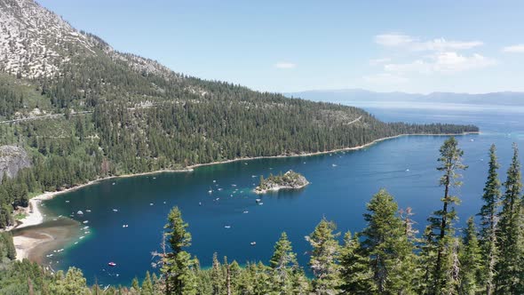 Wide rising aerial shot of Emerald Bay in Lake Tahoe. 4K alt