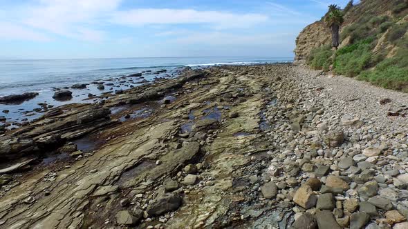 A scenic rocky beach coastline alt