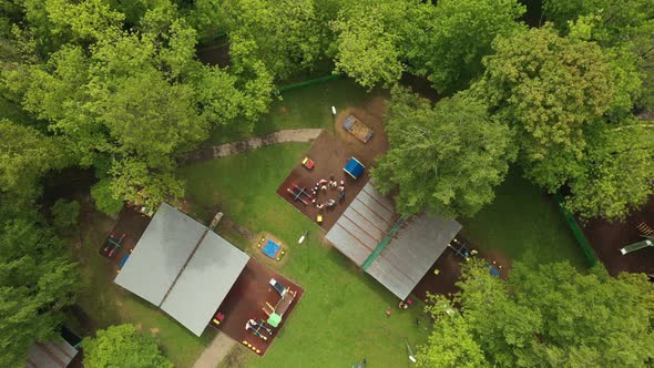 Children Play on the Playground in Kindergarten in Summer Aerial View