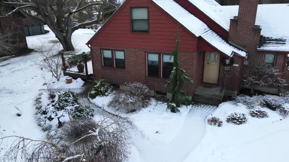 Snowy brick cabin in spokane Washington in heart of winter, beautiful red brick alt
