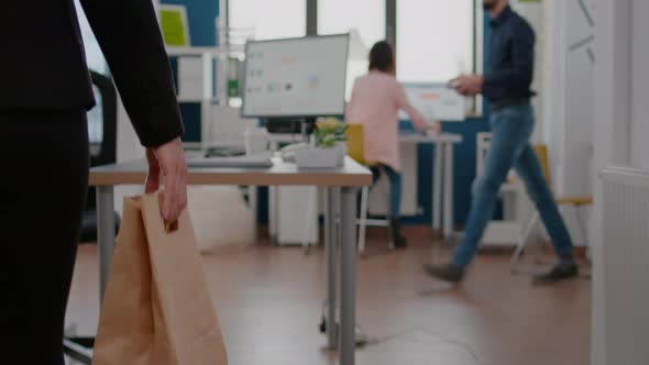 Businesswoman Holding Delivery Takeaway Food Meal Order Paper Bag During Takeout Lunchtime alt