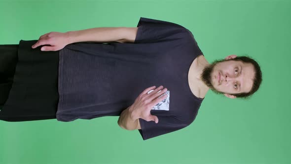 The Man Looks at the Camera in Surprise Indicates Himself Who is Me Waves His Arms and Nods His Head alt