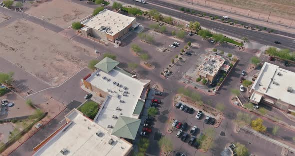 Aerial Top View of Typical a Avondale Small Town Shopping Center with Big Parking Lot a Major alt