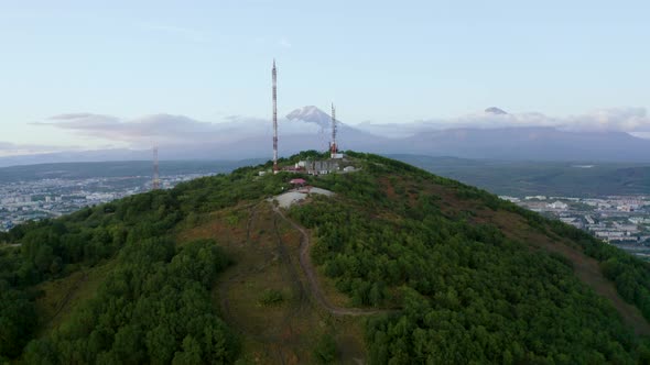 Telecommunications Tower with Volcanoes in the  Petropavlovsk Kamchatsky