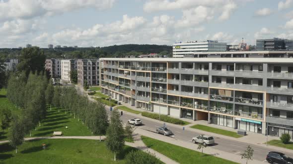 Modern Design of Newly Built Apartment Buildings with Large Glass Balconies on Urban Background alt