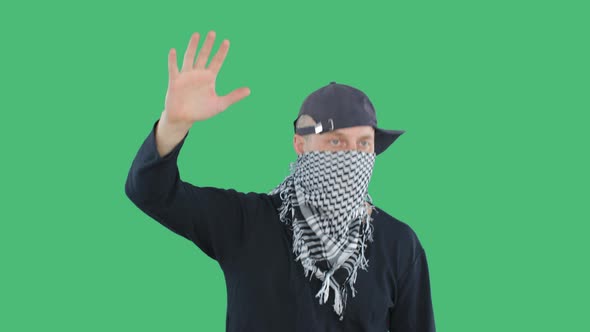 Aggressive Protester Raising Hand During Riot or Political Protest alt