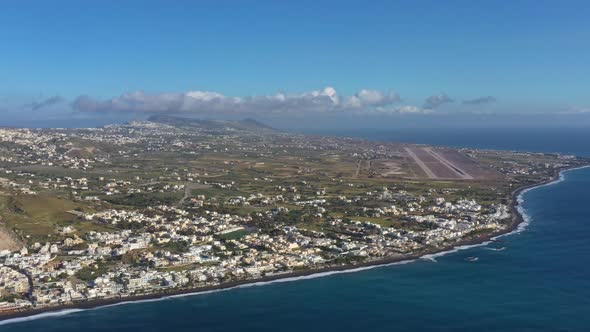 Aerial view of Kamari beach on Santorini island alt