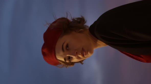 Portrait Of Seductive Young Woman On Sky Background At Dusk. Vertical Video Frame. alt