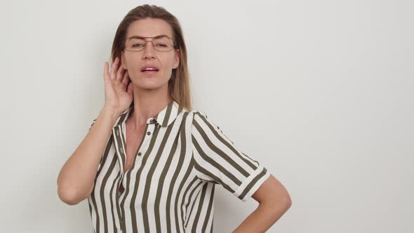 Woman in Striped Top and Glasses
