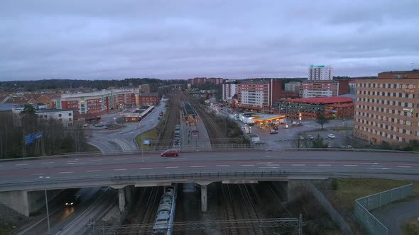 Aerial View of Commuter Train Arriving to Train Station