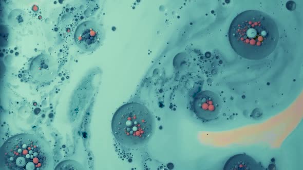 focus pull to abstract blue soap bells moving around in fluid artwork. alt