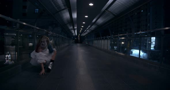 Talented Young Female Dancer in Halloween Costume Dancing in the Bridge alt