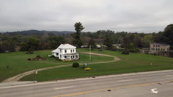 Aerial view of octagon shaped home in rural western Wisconsin in autumn.