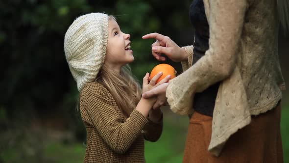 Girl Kissing Her Mother