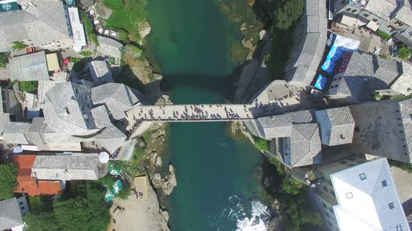 Aerial view of bathing spot next to the bridge on Neretva river in Bosnia alt