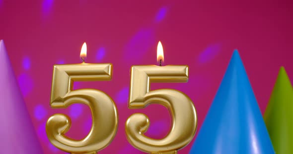 Burning Birthday Cake Candle Number 55