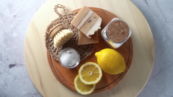 Eco Friendly Natural Cleaners Jar with Baking Soda Dish Brush Lemon Soap on White Background